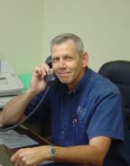 Dave taking a plumbing emergency phone call