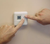 Two People Fighting for Control of the Thermostat